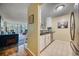 Modern kitchen with stainless steel appliances and granite countertops at 900 Cove Cay Dr # 1H, Clearwater, FL 33760