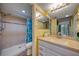 Clean bathroom with shower, toilet, and a vanity with ample counter space at 900 Cove Cay Dr # 1H, Clearwater, FL 33760