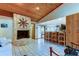 Spacious living room features a stone fireplace and kitchen access at 4981 61St S Ave, St Petersburg, FL 33715