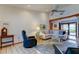 Open living space featuring comfortable seating, a tiled floor, and ample natural light at 4981 61St S Ave, St Petersburg, FL 33715