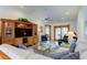 Spacious living room with comfortable seating, a large TV, and access to a patio at 4981 61St S Ave, St Petersburg, FL 33715