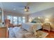 Bright main bedroom with king-size bed and access to patio at 4981 61St S Ave, St Petersburg, FL 33715