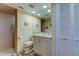 Updated bathroom with walk-in shower and built-in storage at 4981 61St S Ave, St Petersburg, FL 33715