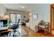 Bright home office features built-in desk, seating area, and pool view at 4981 61St S Ave, St Petersburg, FL 33715