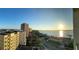 Aerial view of building and surrounding area at sunset at 1380 Gulf Blvd # 1008, Clearwater Beach, FL 33767