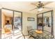 Outdoor balcony with glass table and seating, accessible from the bedroom and living room at 1380 Gulf Blvd # 1008, Clearwater Beach, FL 33767