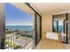 Relax on this condo balcony with panoramic water views and comfortable seating at 1380 Gulf Blvd # 1008, Clearwater Beach, FL 33767