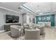 Modern common area with TV and seating at 1380 Gulf Blvd # 1008, Clearwater Beach, FL 33767