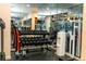 Fully equipped gym featuring dumbbells, water cooler and mirrored walls, perfect for fitness enthusiasts at 1380 Gulf Blvd # 1008, Clearwater Beach, FL 33767