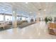 Bright condo lobby with tiled floors, recessed lighting, plenty of seating, and a reception desk at 1380 Gulf Blvd # 1008, Clearwater Beach, FL 33767