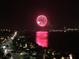 Spectacular waterfront view with a brilliant fireworks display over the city lights at night at 1380 Gulf Blvd # 1008, Clearwater Beach, FL 33767