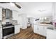 Modern kitchen with stainless steel appliances and granite countertops at 2499 Indigo Dr, Clearwater, FL 33763