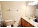 Clean bathroom with vanity, toilet, and shower/tub at 1427 Hillview Ln, Tarpon Springs, FL 34689