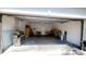 Garage with storage and a grill at 1427 Hillview Ln, Tarpon Springs, FL 34689