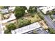 Aerial view of vacant land lot next to other properties at 14255 Walsingham Rd, Largo, FL 33774