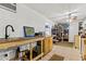 Utility room with sink, shelving and plenty of storage space at 240 Windward Psge # 602, Clearwater Beach, FL 33767