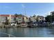 Waterfront view of townhomes with boat docks and easy water access at 240 Windward Psge # 602, Clearwater Beach, FL 33767