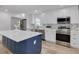 Renovated kitchen with stainless steel appliances, island, and lots of counter space for cooking at 7414 Van Dyke Rd, Odessa, FL 33556