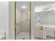 Walk-in shower with grab bars and tiled walls at 200 121St Ave # 101, Treasure Island, FL 33706