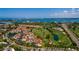 Spectacular aerial view of the community, golf course, and bridge access to nearby areas at 6011 Bahia Del Mar Blvd # 150, St Petersburg, FL 33715