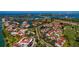Impressive aerial view of the community's waterfront location, highlighting the pool and surrounding buildings at 6011 Bahia Del Mar Blvd # 150, St Petersburg, FL 33715