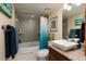 Modern bathroom with a granite countertop, vessel sinks, and tub/shower combo at 6011 Bahia Del Mar Blvd # 150, St Petersburg, FL 33715