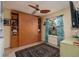 Guest bedroom with a murphy bed and built-in shelves and storage at 6011 Bahia Del Mar Blvd # 150, St Petersburg, FL 33715