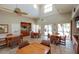 Spacious clubhouse interior with high vaulted ceiling, kitchen, and sitting area at 6011 Bahia Del Mar Blvd # 150, St Petersburg, FL 33715