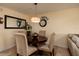 Dining area with round table and stylish light fixture at 6011 Bahia Del Mar Blvd # 150, St Petersburg, FL 33715