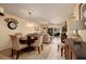 Dining area adjacent to the living room with sliding door access to the patio at 6011 Bahia Del Mar Blvd # 150, St Petersburg, FL 33715