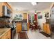 Eat-in kitchen with breakfast bar, granite counters, and stainless steel appliances at 6011 Bahia Del Mar Blvd # 150, St Petersburg, FL 33715