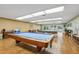 Well-lit game room with pool tables at 5396 Acacia N Trl, Pinellas Park, FL 33782