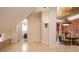 Bright hallway with views into the formal dining room at 550 E East Lake N Rd, Tarpon Springs, FL 34688