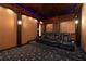 State-of-the-art home theater with luxurious seating at 550 E East Lake N Rd, Tarpon Springs, FL 34688