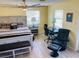 Bedroom with a king bed, workspace, and chair at 1826 58Th S St, Gulfport, FL 33707