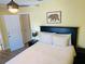 Cozy bedroom with a ceiling fan and ample closet space at 1826 58Th S St, Gulfport, FL 33707