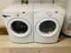Laundry room with side-by-side Whirlpool washer and dryer at 1826 58Th S St, Gulfport, FL 33707