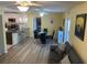 Open dining area with seating for six and views of the kitchen at 1826 58Th S St, Gulfport, FL 33707