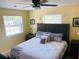 Main bedroom with king-size bed, and water view at 1826 58Th S St, Gulfport, FL 33707