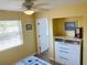 Bright bedroom with built-in dresser and window seat at 1826 58Th S St, Gulfport, FL 33707