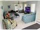 Living room with comfortable seating and large TV at 1826 58Th S St, Gulfport, FL 33707