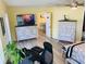 Bedroom with two dressers and a view into another room at 1826 58Th S St, Gulfport, FL 33707