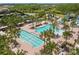 Aerial view of community pool with lap lanes and a recreational area at 31275 Spruceberry Ct, Wesley Chapel, FL 33543