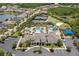 Aerial view of community with pool, tennis, and basketball courts at 31275 Spruceberry Ct, Wesley Chapel, FL 33543