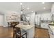 Modern kitchen with large island, stainless steel appliances, and granite countertops at 31275 Spruceberry Ct, Wesley Chapel, FL 33543