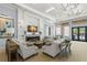 Spacious clubhouse lounge area with fireplace and large screen TV at 31275 Spruceberry Ct, Wesley Chapel, FL 33543