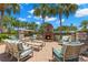 Outdoor fire pit with comfortable seating for relaxing evenings at 31275 Spruceberry Ct, Wesley Chapel, FL 33543