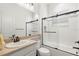 Bathroom with single vanity, shower/tub combo and window at 31275 Spruceberry Ct, Wesley Chapel, FL 33543