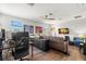 Spacious home office with a large desk and comfortable chair at 31275 Spruceberry Ct, Wesley Chapel, FL 33543