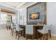 Community clubhouse bar with seating for residents at 31275 Spruceberry Ct, Wesley Chapel, FL 33543